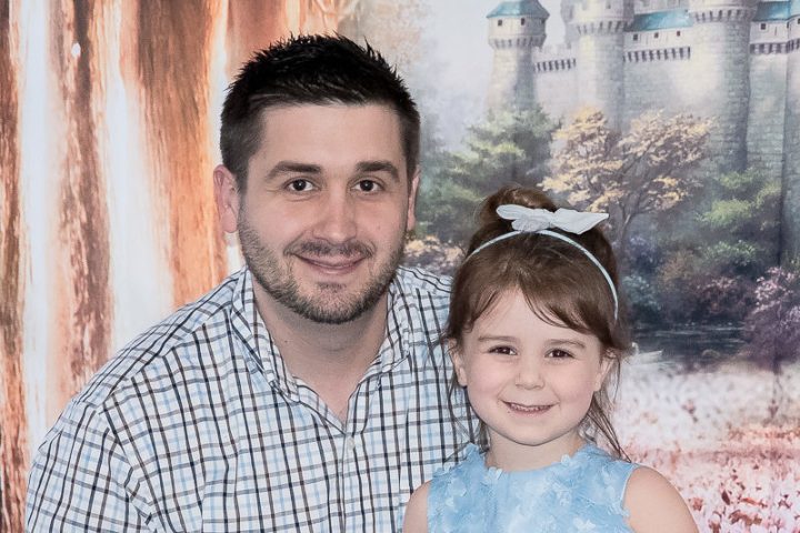 a man and a woman posing for a picture